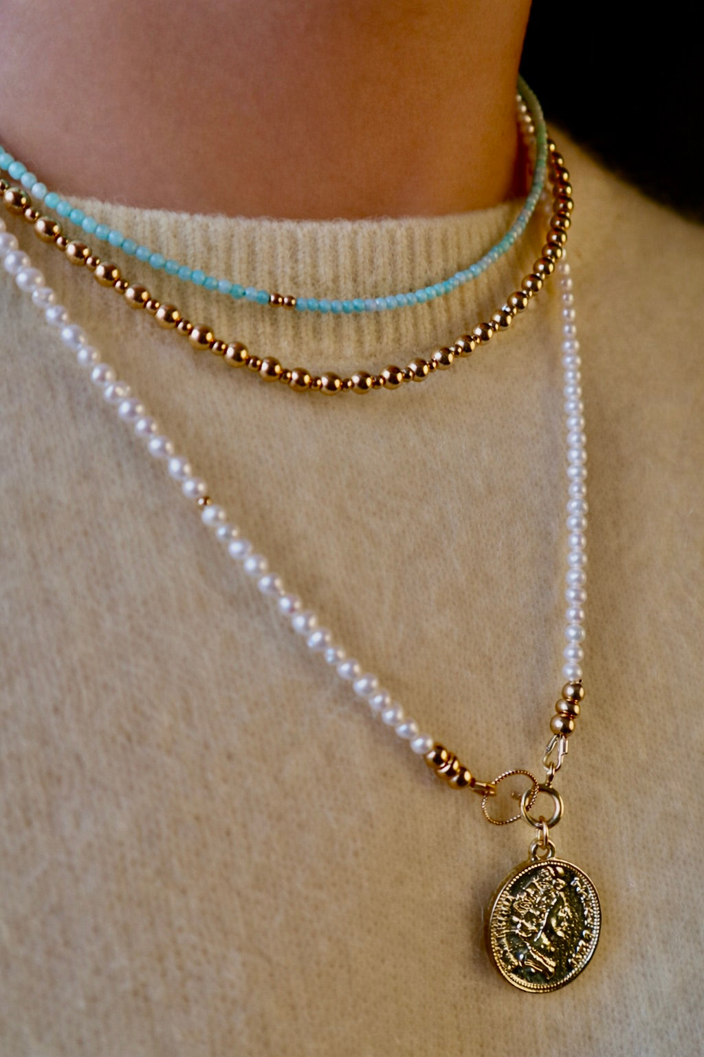 ketting van facet geslepen amazoniet en goldfilled kraaltjes