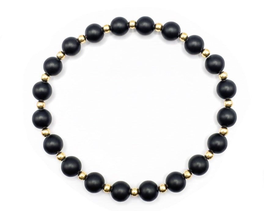 armband met zwarte matte onyx mat afgewisseld met goldfilled kralen