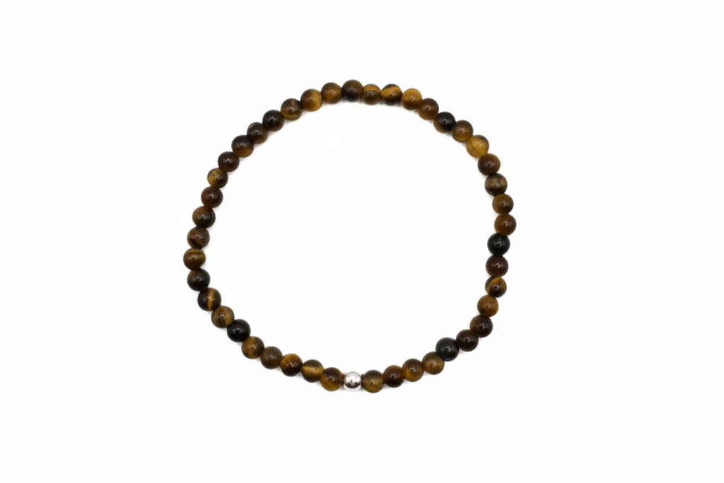 armbandje van ronde tijgeroogkralen en een sterling zilveren kraal