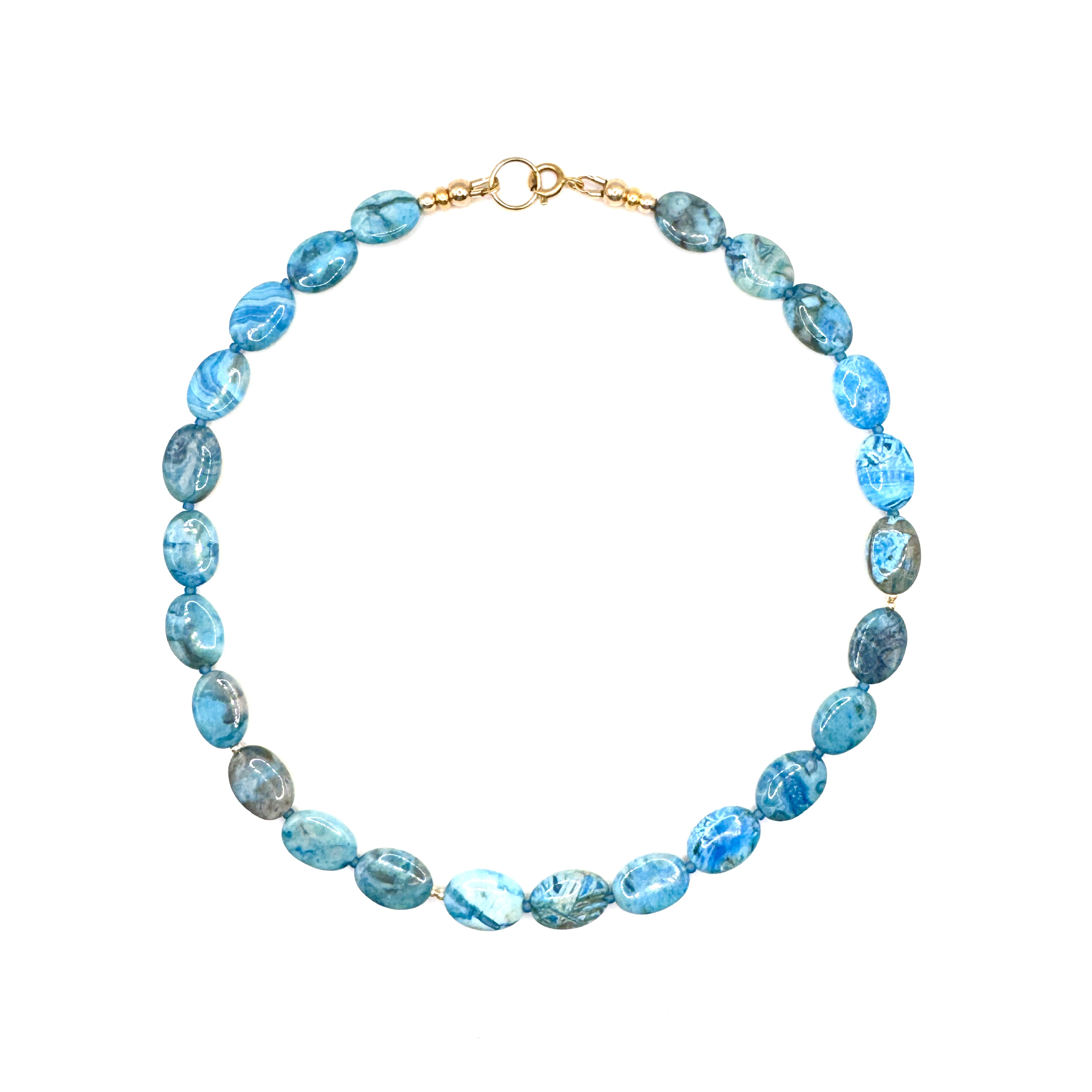 ketting van platte agaat stenen en een aantal goldfilled kraaltjes