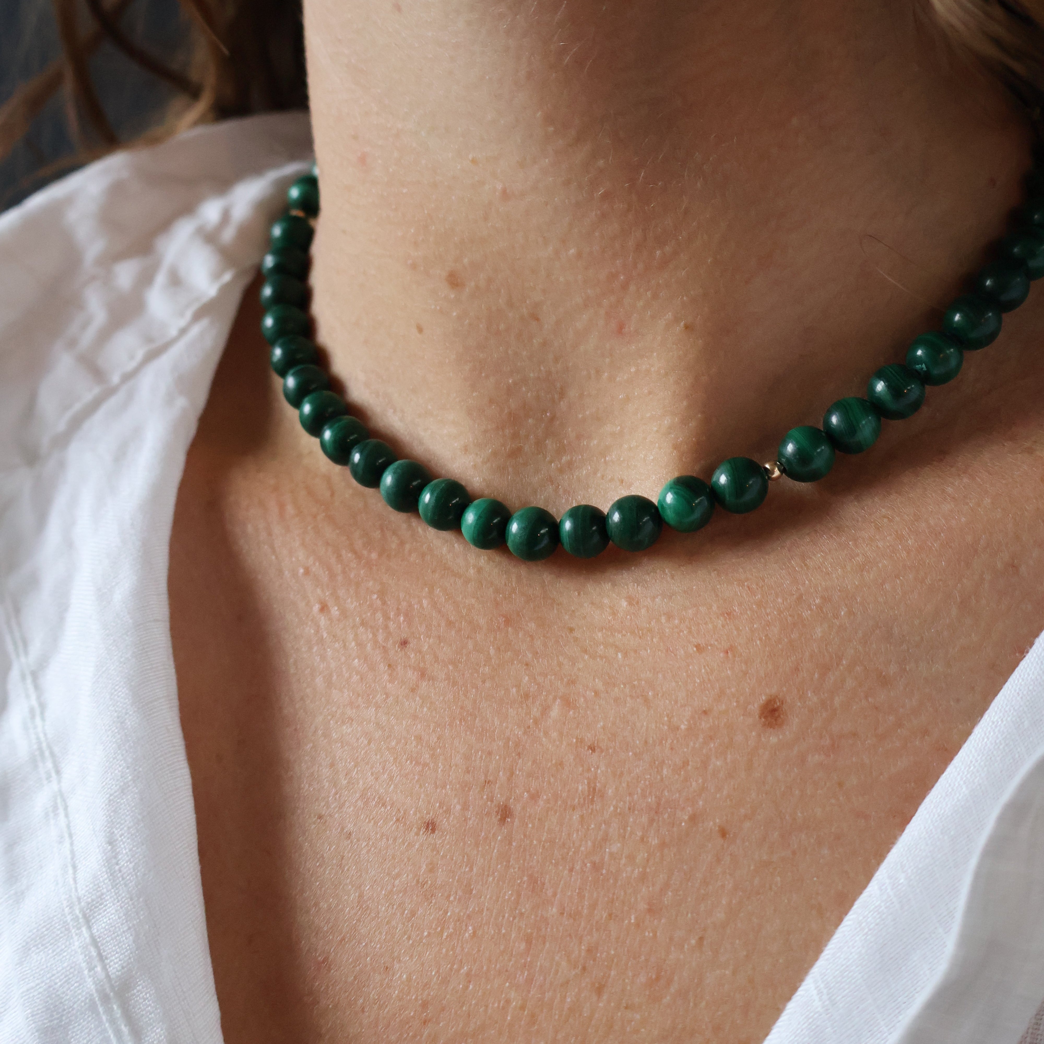 ketting van ronde malachiet en goldfilled kralen