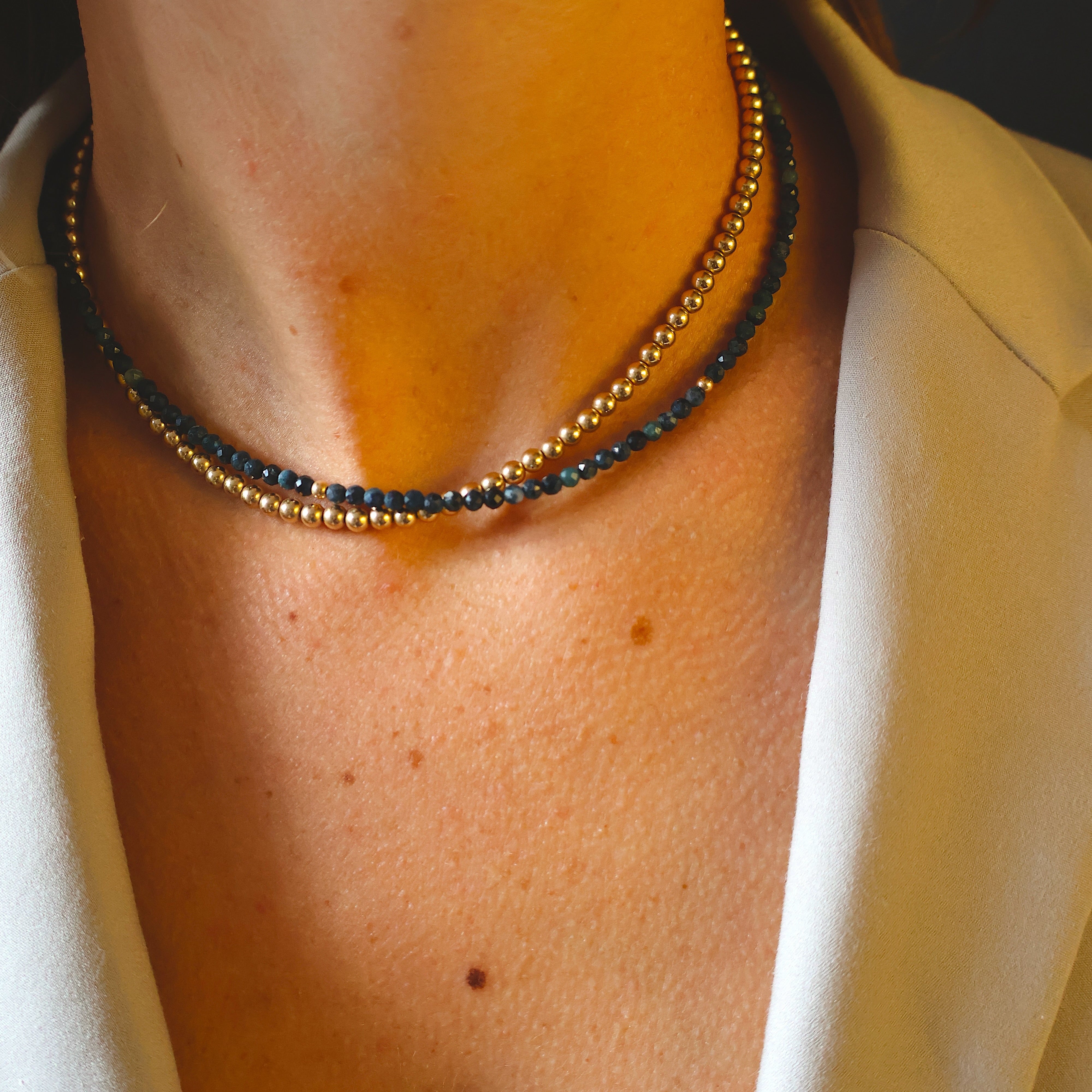 ketting van blauwe toermalijn facet en goldfilled kraaltjes