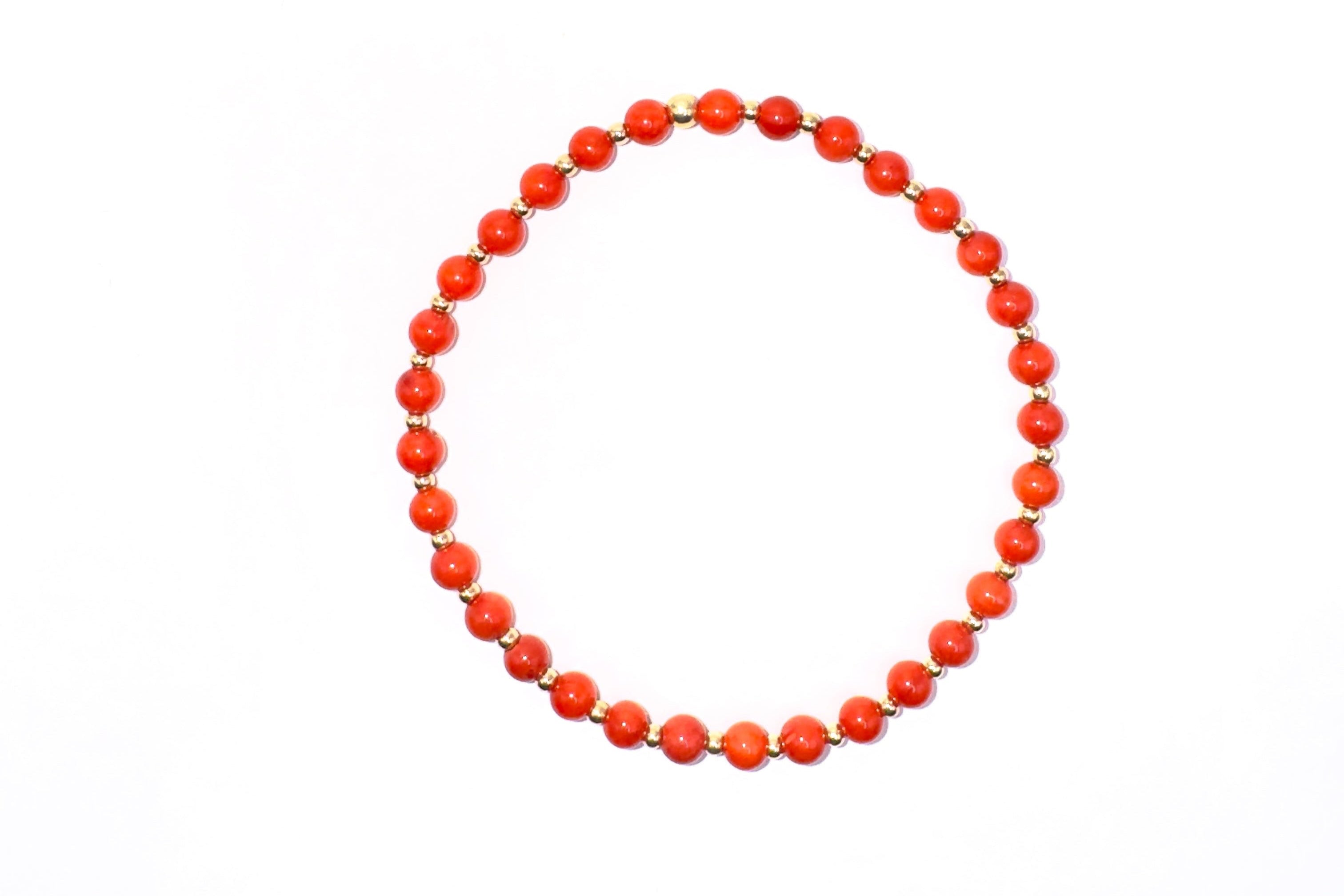 armband van ronde bloedkoraal en goldfilled kralen