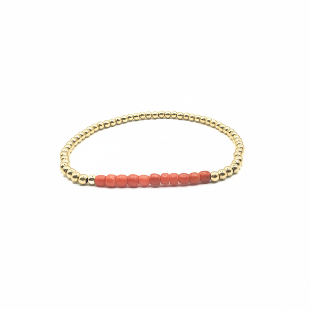 armband goldfilled en bloedkoraal kralen