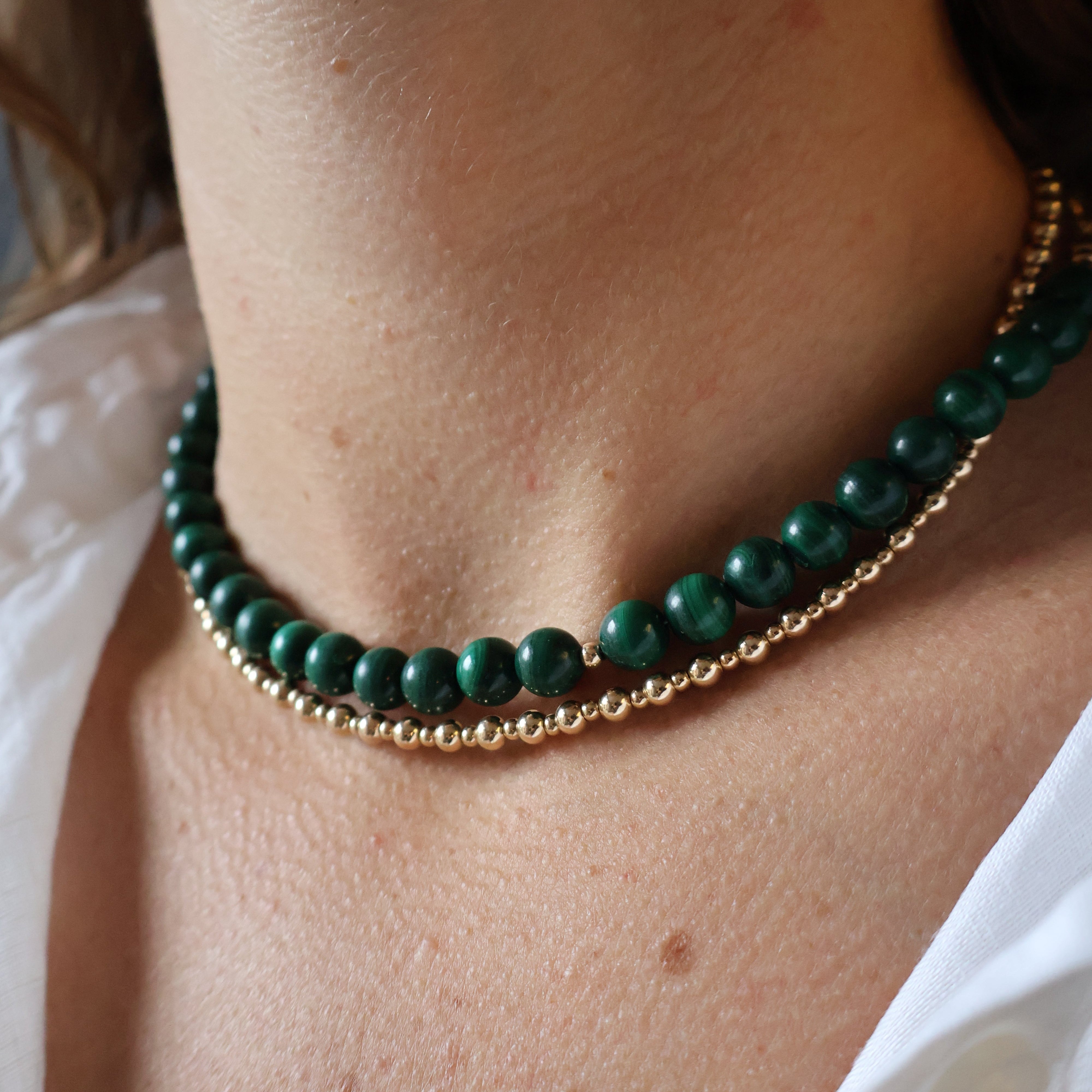 ketting van ronde malachiet en goldfilled kralen