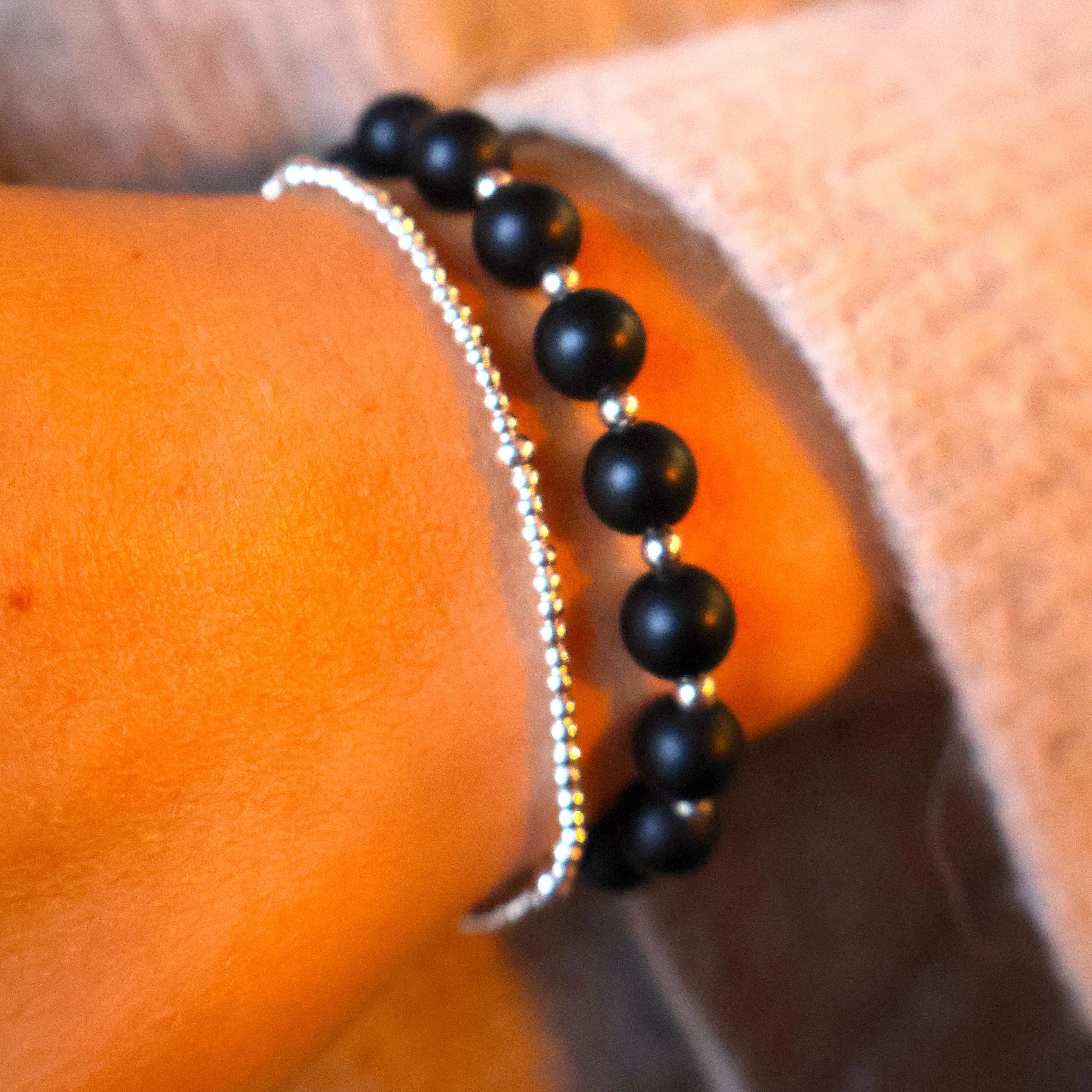 zwarte onyx met zilveren kralen