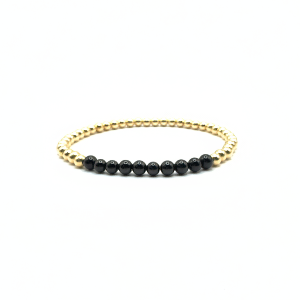 armband van goldfilled  met zwarte onyx kralen