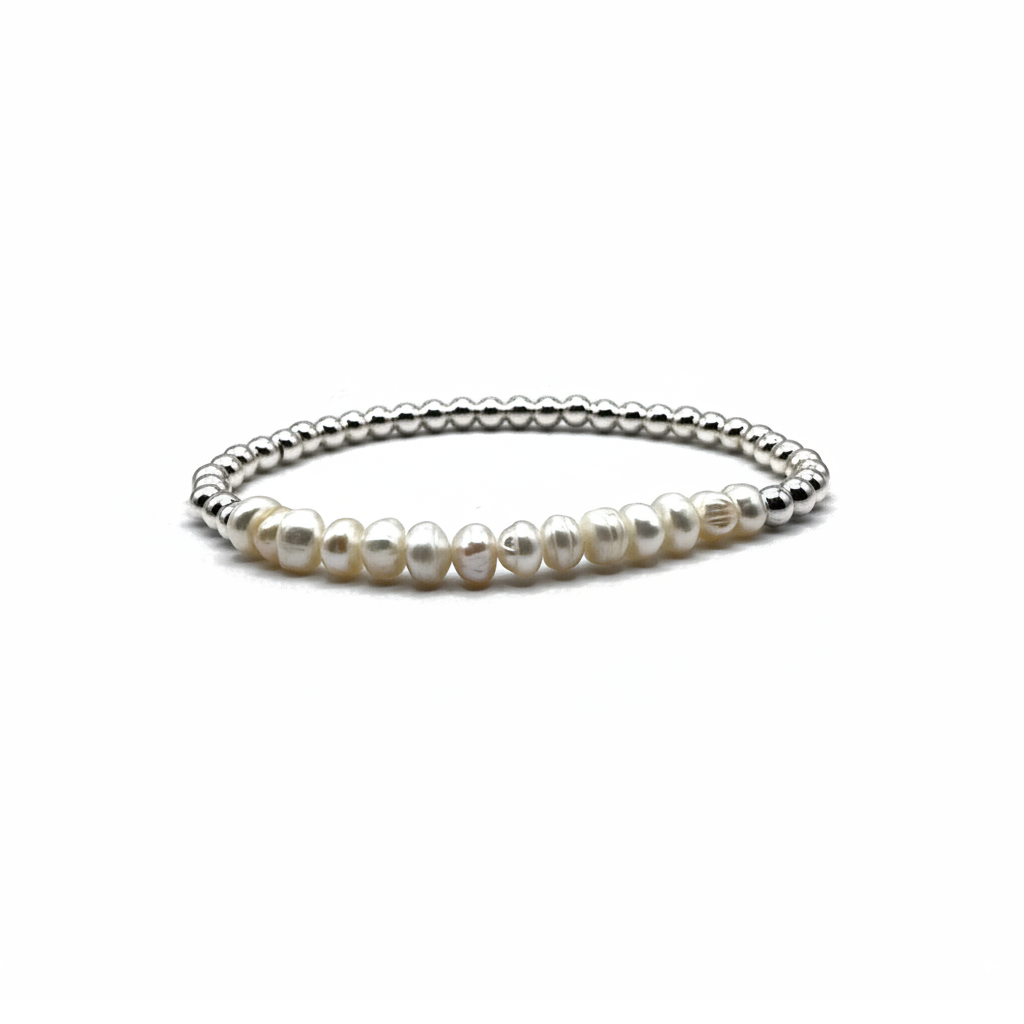 zilveren armband met in het midden ovale pareltjes